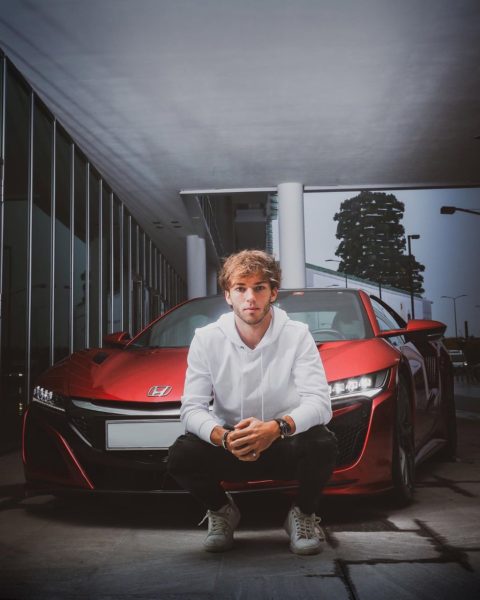 Pierre Gasly with his car Image
